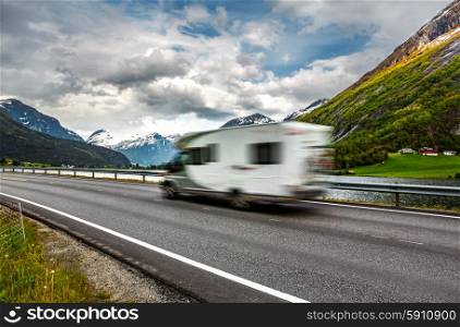 Caravan car travels on the highway. Caravan Car in motion blur.