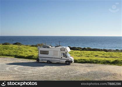 Caravan on the beach in front of the ocean in Sagres, Portugal