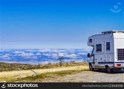 Caravan rv above clouds. Motor home c&ing car in mountain nature in Portugal. Adventure with c&er vehicle.. Rv c&er in mountains above clouds