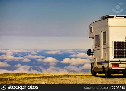 Caravan rv above clouds. Motor home camping car in mountain nature in Portugal. Adventure with camper vehicle.. Rv camper in mountains above clouds