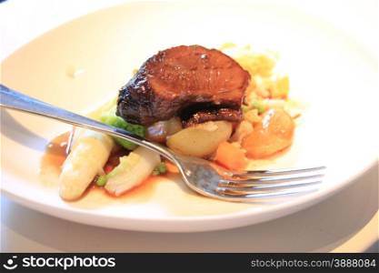 Carbonade flamande with potatoes and vegetables