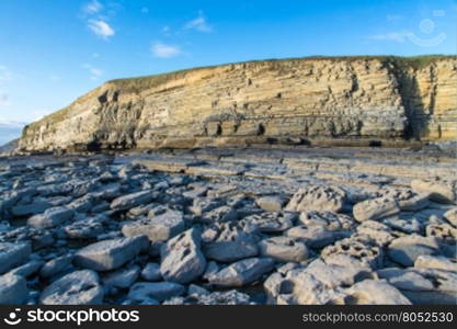 Carboniferous limestone cliffs of Southerndown Beach or Dunraven Bay, afternoon light. Used as Bad Wolf Bay in Doctor Who. South Wales, UK.