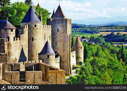 Carcassonne - biggest medieval castle and walled town in Europe. France travel and historic landmarks