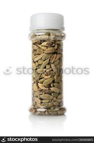 Cardamom in a glass jar isolated on a white background