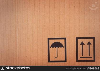 Cardboard background with shipping icons