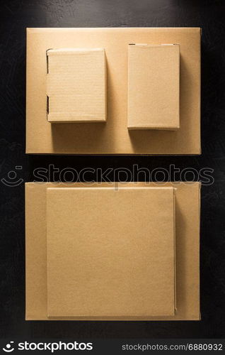 cardboard box on black background surface