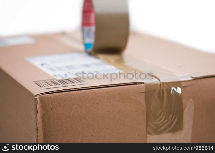 Cardboard box package, shipping concept: Preparing for delivery, isolated