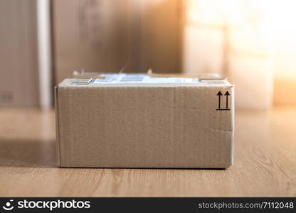 Cardboard box shipping concept: brown parcel