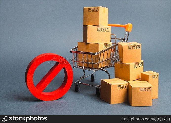 Cardboard boxes, supermarket trolley and red symbol NO. Embargo, trade wars. Restriction on the importation of goods, proprietary for business. Inability to sell products, poor logistics. No delivery.