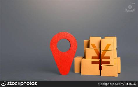 Cardboard boxes with chinese yuan or japanese yen and red pin location tracking symbol. Import export. Delivering. Tracking of deliveries. Freight. Transportation services logistics warehouse