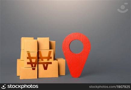 Cardboard boxes with south korean won and red pin location tracking symbol. Transportation logistics, warehouse management. Import export. Delivering. Freight infrastructure. Tracking of deliveries.