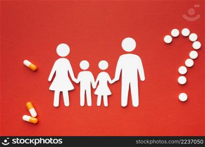 cardboard family shapes with question mark shaped pills