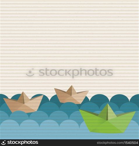 Cardboard paper boat on the blue water