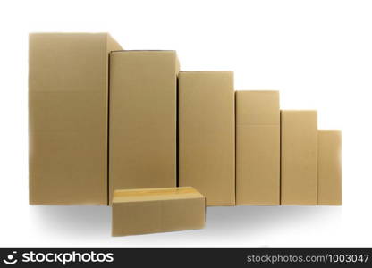 Cardboard parcel boxes stacked on each other at white background
