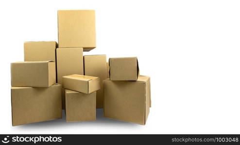 Cardboard parcel boxes stacked on each other at white background