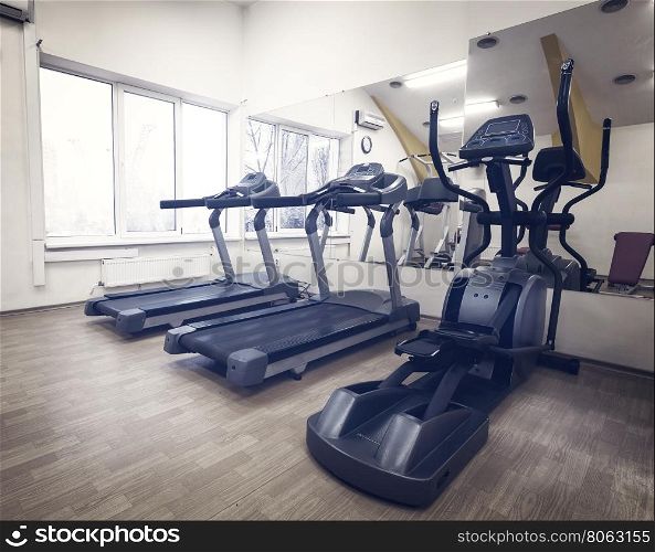 Cardio in the gym against the window. Cardio in the gym