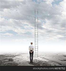 Career ladder. Rear view of businesswoman standing near ladder going high in sky
