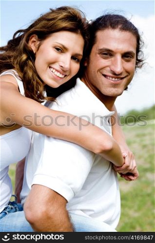 Carefree couple fooling around and smiling