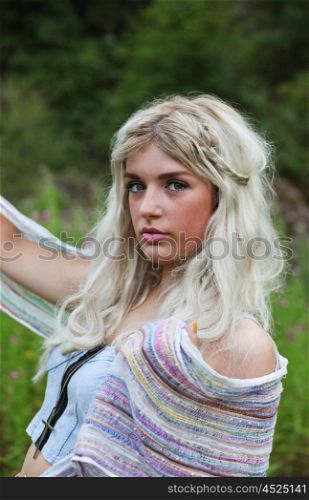 Carfree blonde woman enjoying the outdoors