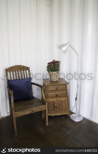 Cargo container cafe with wooden furniture set, stock photo