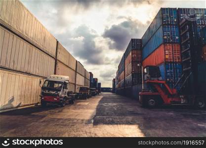 Cargo container for overseas shipping in shipyard with heavy machine . Logistics supply chain management and international goods export concept .. Cargo container for overseas shipping in shipyard with heavy machine .