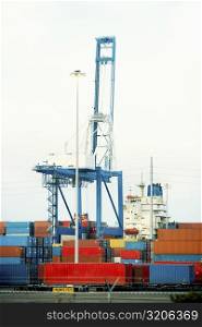 Cargo containers and a crane at a commercial dock, Charleston, South Carolina, USA