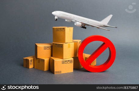 Cargo plane, many boxes and red prohibition symbol NO. Embargo trade wars. Restriction on importation, ban transit export dual-use goods to countries under sanctions. transport companies.