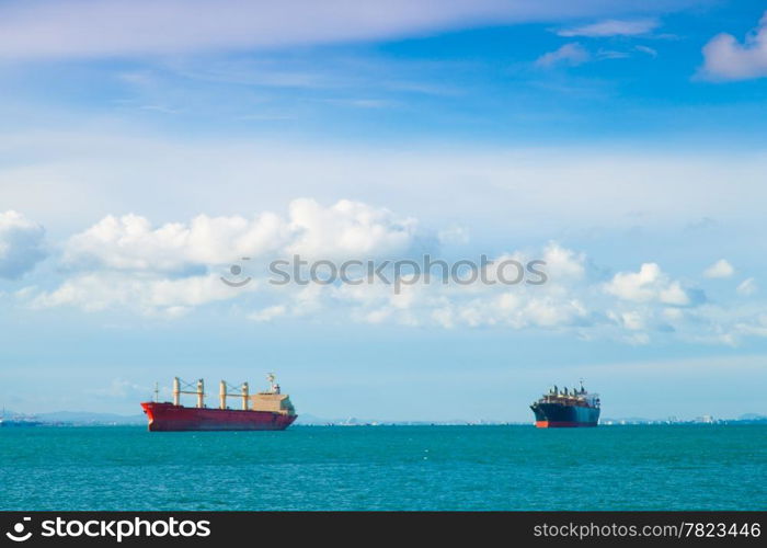 Cargo ship at dock waiting to move product. Ships at sea.
