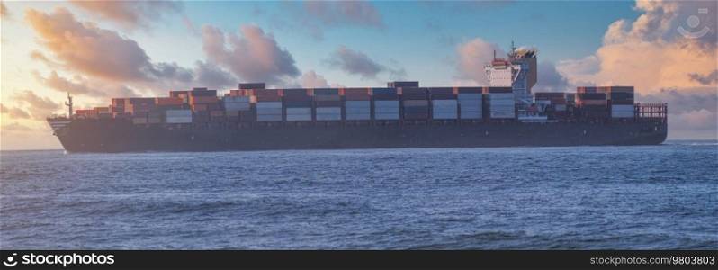 cargo ship in the ocean transports containers with goods