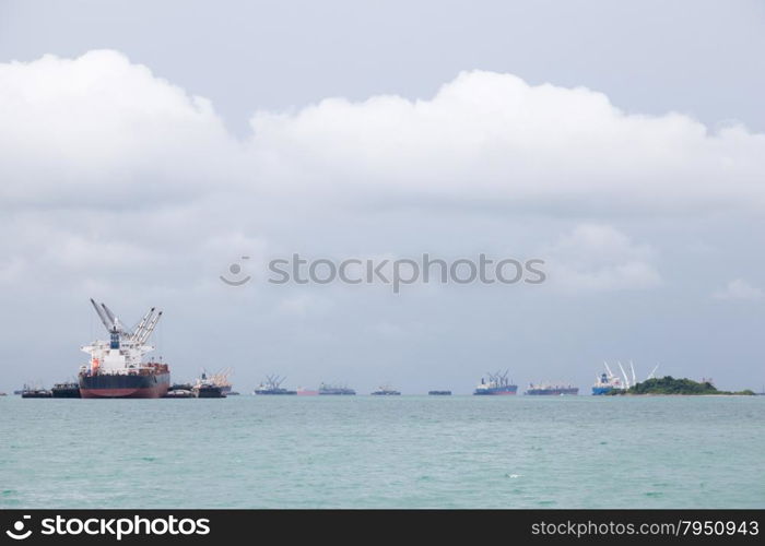 Cargo ship. Parking in the sea to await transportation to the port.