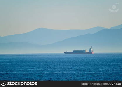 Cargo vessel ship in Aegean Sea Mediterranean sea. Greece. Cargo vessel ship in Aegean Sea