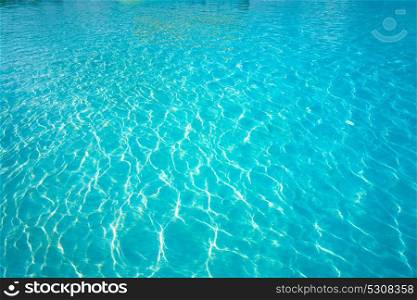Caribbean shallow water texture in turquoise color in Riviera Maya of Mexico