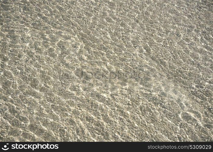 Caribbean transparent water beach reflections in shallow white sand bottom