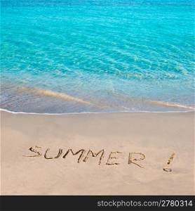 Caribbean tropical beach with Summer word written in sand