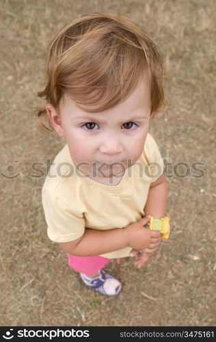 Caricature of a baby girl. Photo taken from above