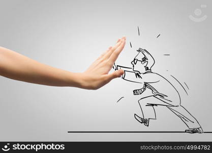 Caricature of businessman and human hand showing stop gesture