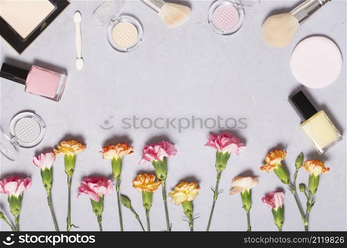 carnations near makeup supplies