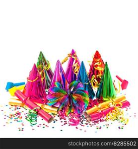 carnival decoration. garlands, streamer, party hats and confetti on white background