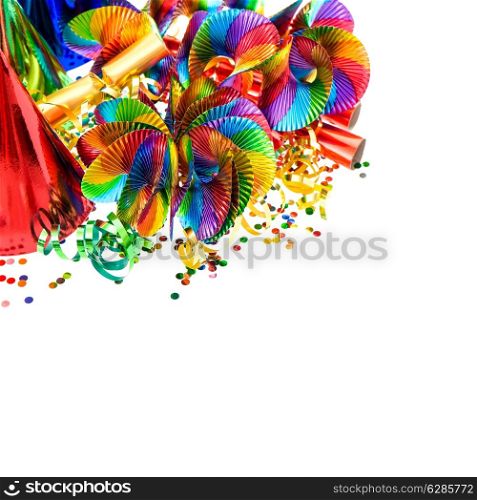 carnival decoration. garlands, streamer, party hats and confetti on white. colorful holidays background
