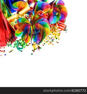 carnival decoration. garlands, streamer, party hats and confetti on white. colorful holidays background