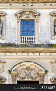 caronno varesino cross church varese italy the old rose window and mosaic wall