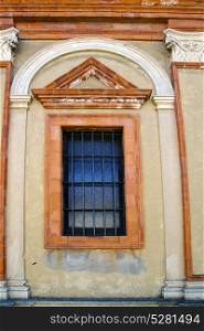 caronno varesino cross church varese italy the old rose window and mosaic wall sunny day