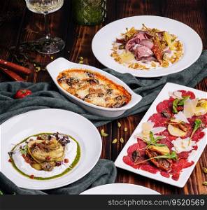 Carpaccio di manzo, Melanzane, Melanzana alla ricotta, Tar-tar with salmon and Vitello tonnato