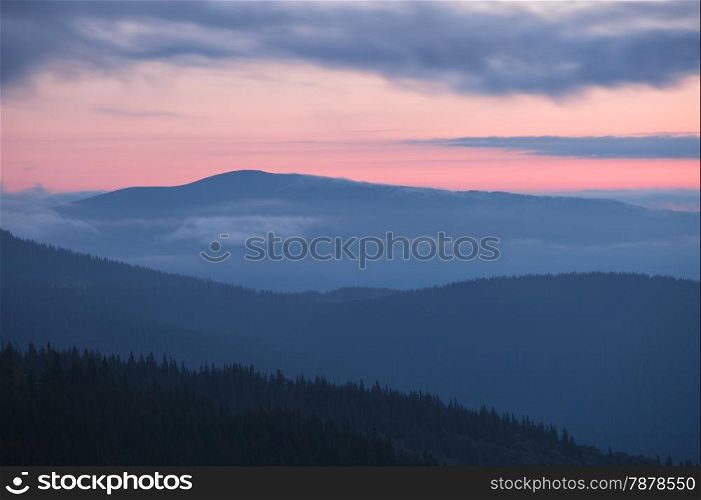 Carpathian mountains silhoutte at sunrise, Ukraine