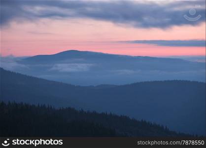Carpathian mountains silhoutte at sunrise, Ukraine