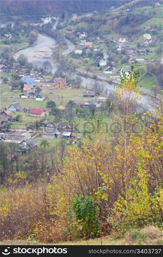 Carpathian Mountains (Ukraine, Zacarpatska Region, Bilyn village) autumn valley view.