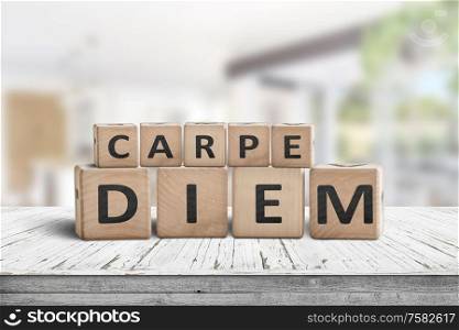 Carpe diem seize the day sign on a table in a bright home environment