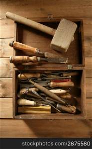 carpenter artist wooden craftman toolbox over wood background