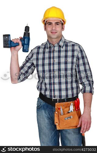 Carpenter holding battery powered drill