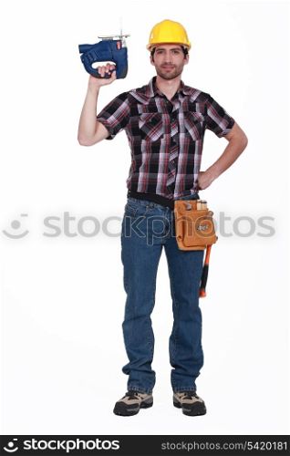 Carpenter holding chainsaw